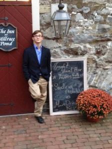 My son, Ian Horowitz, at the entrance, next to the "Vincent Price Dinner, Tavern Full" sign.