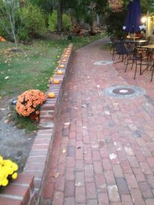 Pumpkins lit with candles graced the entrance path